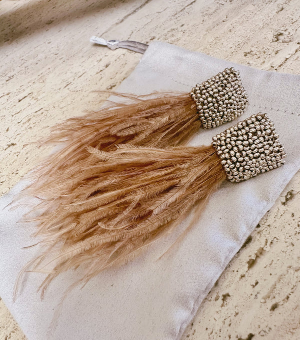 Light tan and gold feather earrings