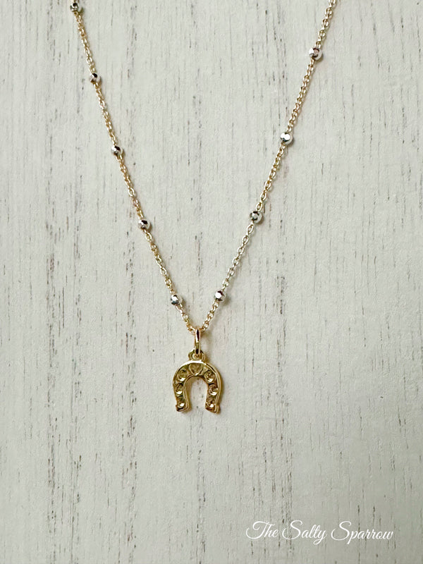 Gold & silver satellite horse shoe necklace