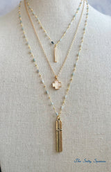 Dainty Mother of Pearl Cross
