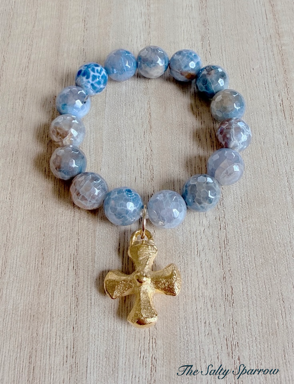 Mystic blue swirl cross bracelet
