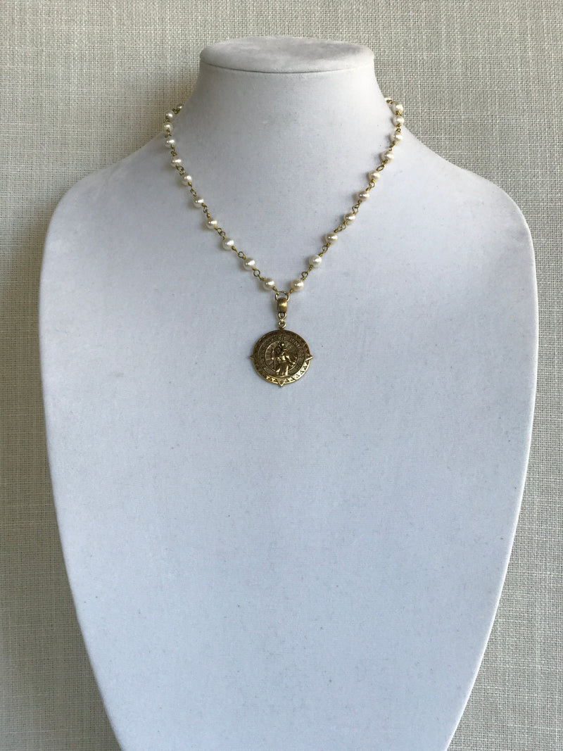 Freshwater pearl necklace with brass St. Christopher pendant