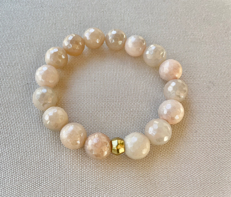 Ultra faceted mystic peach sunstone bracelet with gold accent