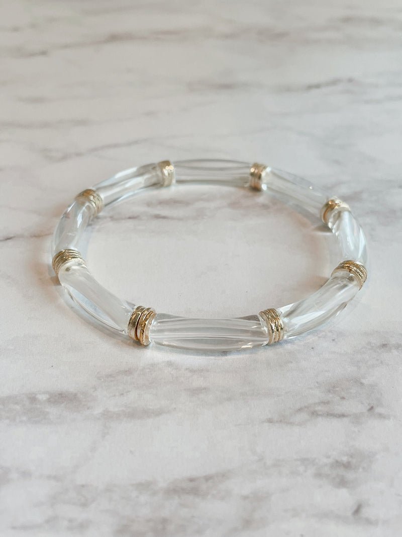 Small cylinder clear lucite bangle